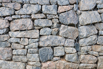 Stones in steel mesh cage (background, texture, abstract)