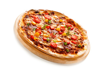 Pizza pepperoni with tomatoes, mushrooms and pepper