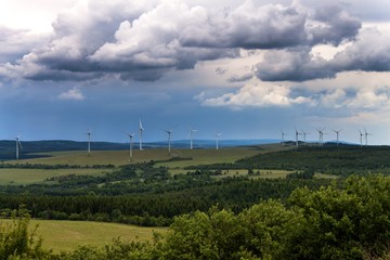 Wind turbines in a wind power plant for the production of renewable energy in the Czech Republic.