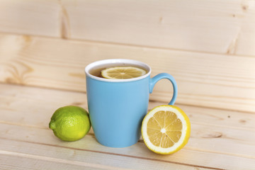blue cup of tea with lemon