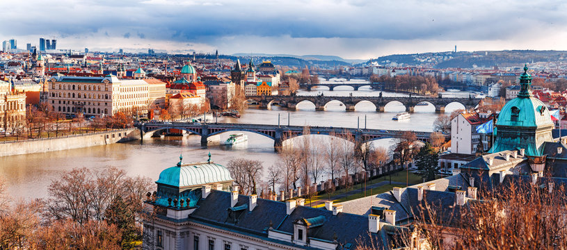 Breathtaking panorama of old Prague city. Bridges vista over Vltava river delta. Czech Republic, Europe.