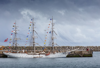 Fototapeta na wymiar Ancient sailboats moored in port Sines, Portugal