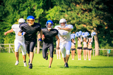 American Football Players Running