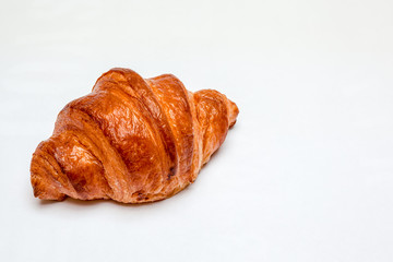 an croissant on white