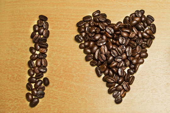 coffee concept - roasted coffee beans