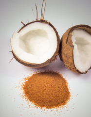 Coconut with coconut sugar isolated on white background.