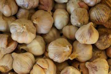 Fresh garlic in the market. For food, kitchen, texture, background and vegetables.
