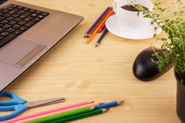 Brown wood office desk table with office accessories. Top view with copy space. Concept for website banner, background, presentation and marketing material.