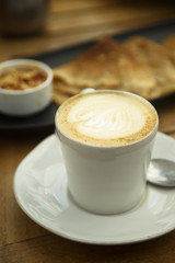 Cup of cappuccino, outdoors