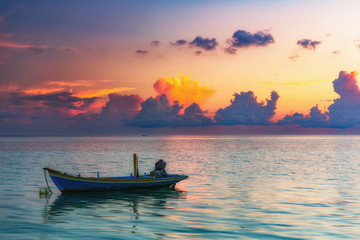 Calm sunrise over ocean on Maldives