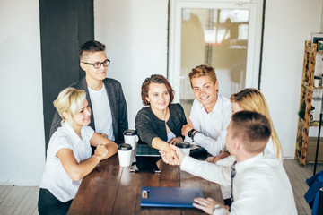 Business people shaking hands, finishing up a meeting