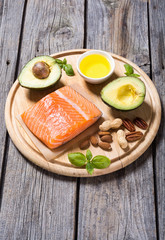 Healthy food vegetables , nuts and salmon