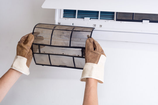 Removing dirty air conditioner filter