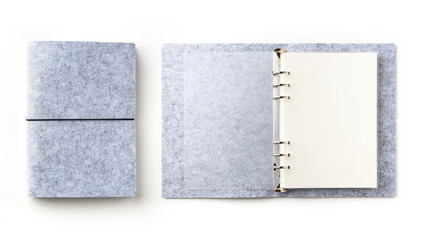 Business concept - Top view collection of grey spiral notebook on white background desk for mockup