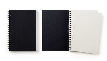 Business concept - Top view collection of black spiral notebook on white background desk for mockup