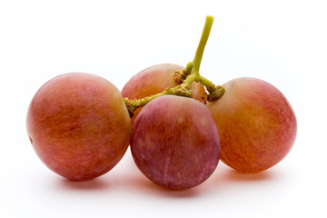 Ripe red grape isolated on white.