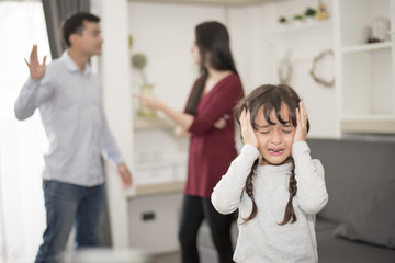 The girl was crying because parents quarrel