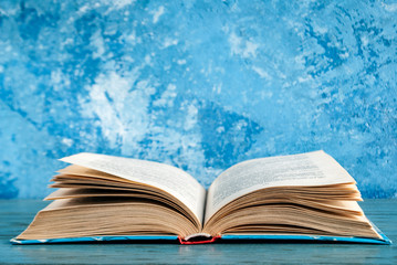 open book on a blue background