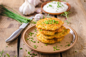 Potato pancakes with sour cream