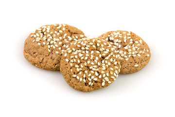 Chocolate brown cookies close up isolated on white background