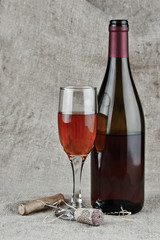 wine bottle and corkscrew