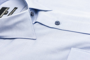 close up of new business shirt for men on white