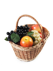 apples and grapes in a basket