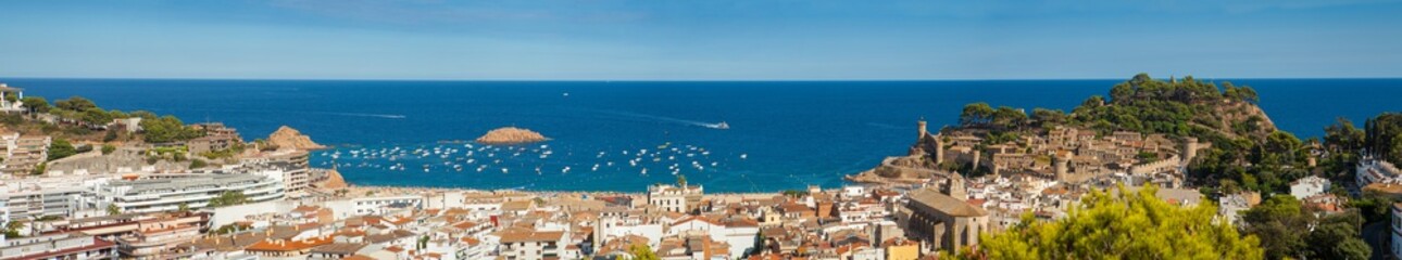 Panorama of the town of Tossa de mar one of the most beautiful towns on the Costa Brava. City walls and medieval castle on the hill. Amazing city in Girona.