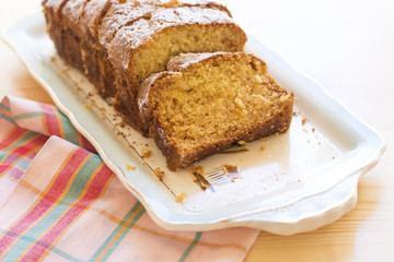 sweet almond homemade cake on white plate with coffee