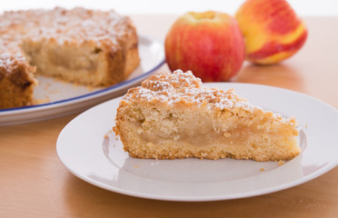 piece of apple pie with crumbles