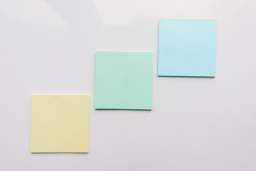 Three square sheet on a white background. Top view. Close-up