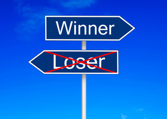 Winner vs looser road sign