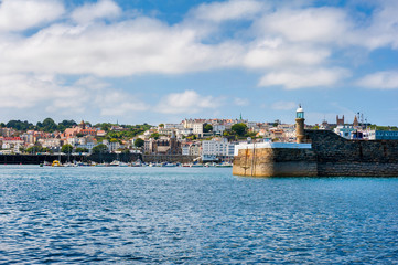 Entrance to Harbor of Saint Peter Port, Guernsey, Channel Islands, UK