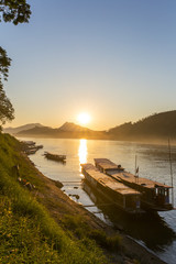 Obraz na płótnie Canvas Boats on the Mekong river, Luang Prabang, Laos