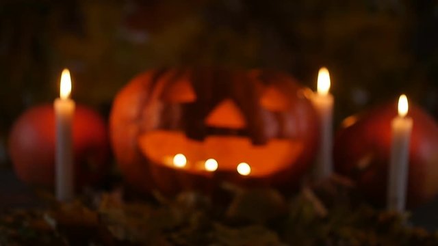 Glowing smoking monster pumpkin. Halloween concept