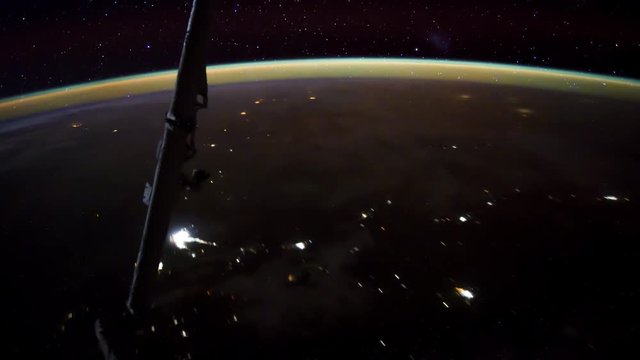 International Space Station view of rotating planet earth with lightning storm and aurora. Created from Public Domain images of NASA Johnson Space Center : http://eol.jsc.nasa.gov. 