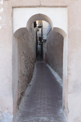 Narrow street in the old city of Dubai UAE