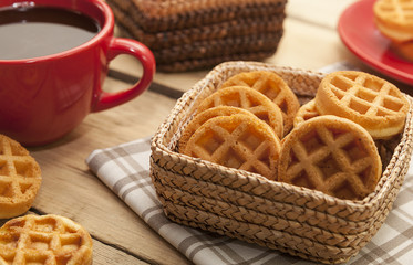 Viennese round waffles and a cup of black coffee