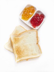 Slice toast bread with strawberry and orange jam isolated