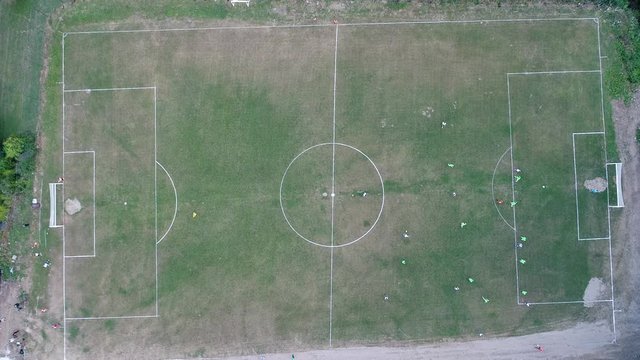 aerial soccer stadium game match  flat lay top view flying with drone