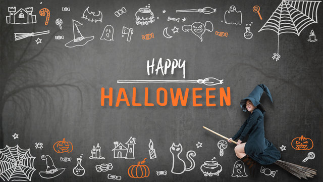 Happy halloween with girl kid in witch costume riding broomstick on spooky dark black chalkboard with chalk doodle of trick or treat candies and scary ghost for holiday greeting festival celebration