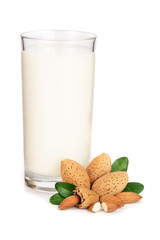 Glass of almond milk isolated on white background