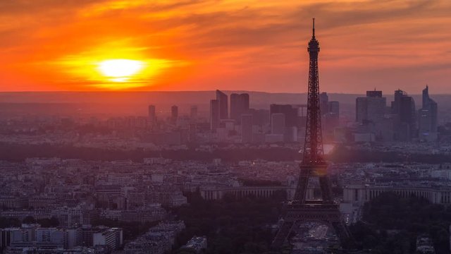 Panorama of Paris at sunset timelapse. Eiffel tower view from montparnasse building in Paris - France