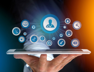 Businessman in front of a wall with a business network connection displayed on a futuristic interface with technology icon - Worldwide business concept