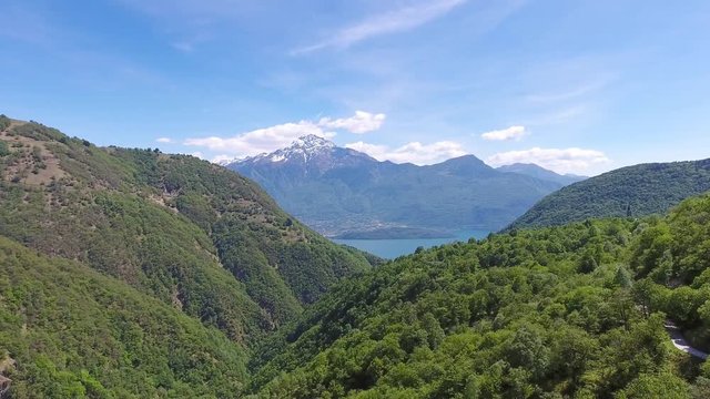 Aerial landscape on Como lake between mountains in Italy, 4k

