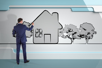 Businessman drawing sketch house plan project on a board 3D rendering