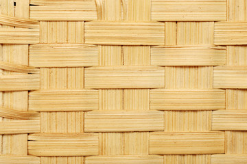 Yellow wicker basket fragment macro shot, abstract texture
