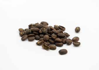  Isolated dark roasted coffee beans on white background