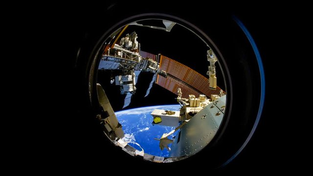 International Space Station view of rotating cloudy planet earth. Created from Public Domain images, courtesy of NASA Johnson Space Center : http://eol.jsc.nasa.gov. 