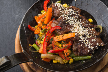 Grilled meat with sesame and grilled vegetables